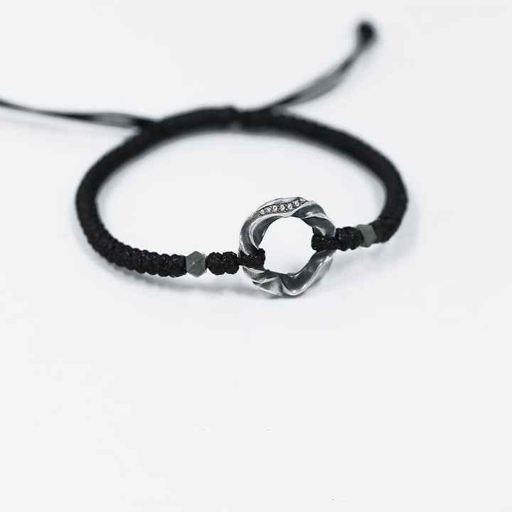 Braccialetto di protezione in corda di cera nera con fibbia della pace in argento sterling 999 Buddha Stones