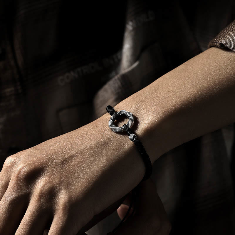 Braccialetto di protezione in corda di cera nera con fibbia della pace in argento sterling 999 Buddha Stones