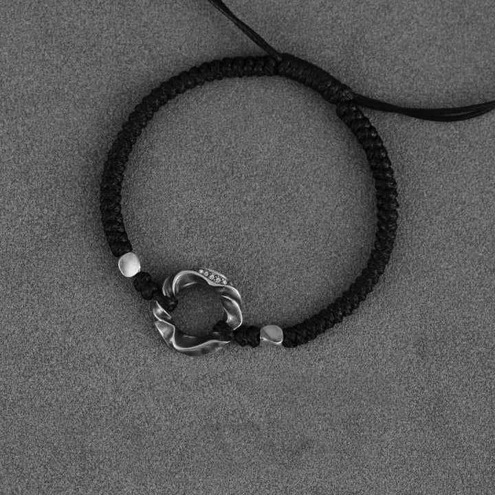 Braccialetto di protezione in corda di cera nera con fibbia della pace in argento sterling 999 Buddha Stones
