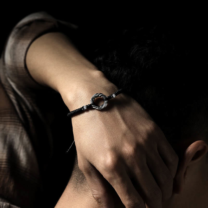 Braccialetto di protezione in corda di cera nera con fibbia della pace in argento sterling 999 Buddha Stones
