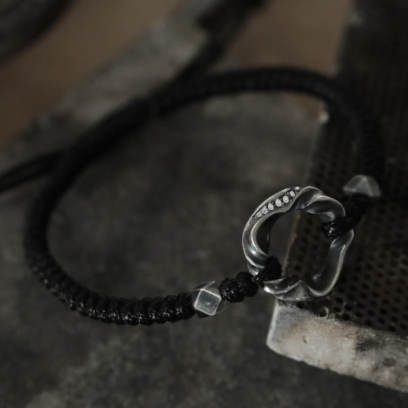 Braccialetto di protezione in corda di cera nera con fibbia della pace in argento sterling 999 Buddha Stones