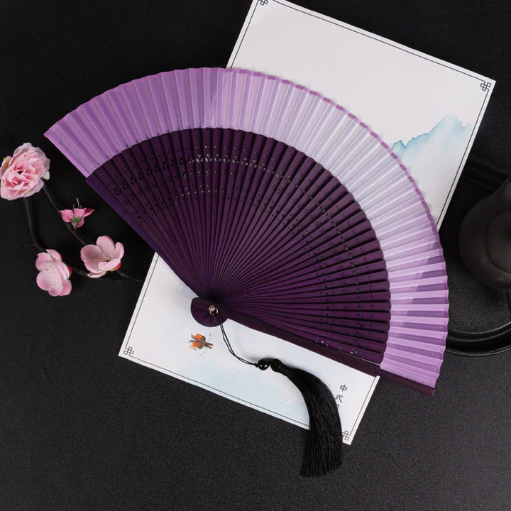 Buddha Stones Cranes Auspicious Clouds Solid Color Gradient Handheld Bamboo Folding Fan - Sfumatura viola 21 cm - image 20