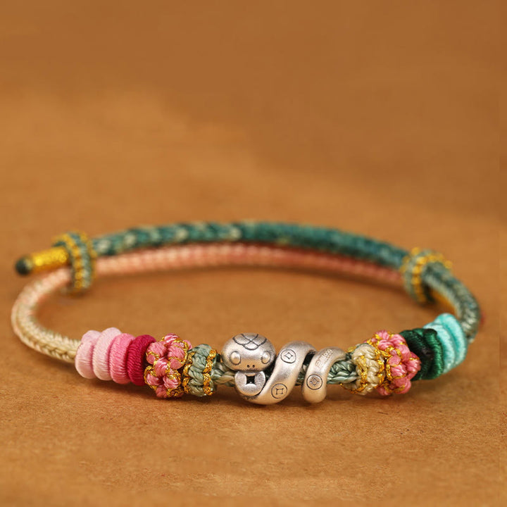 Bracciale intrecciato con protezione per monete in rame fatto a mano con Buddha Stones in argento sterling 999 Anno del serpente