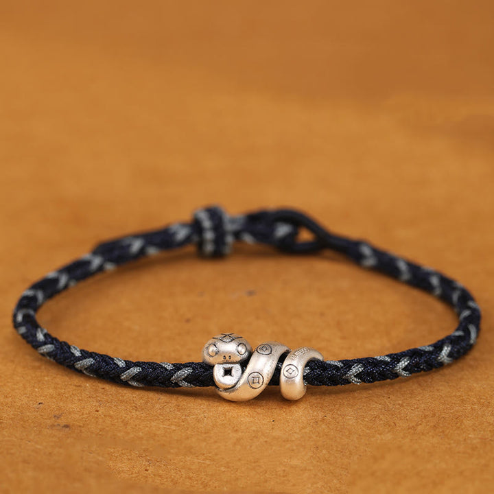 Bracciale intrecciato con protezione per monete in rame fatto a mano con Buddha Stones in argento sterling 999 Anno del serpente