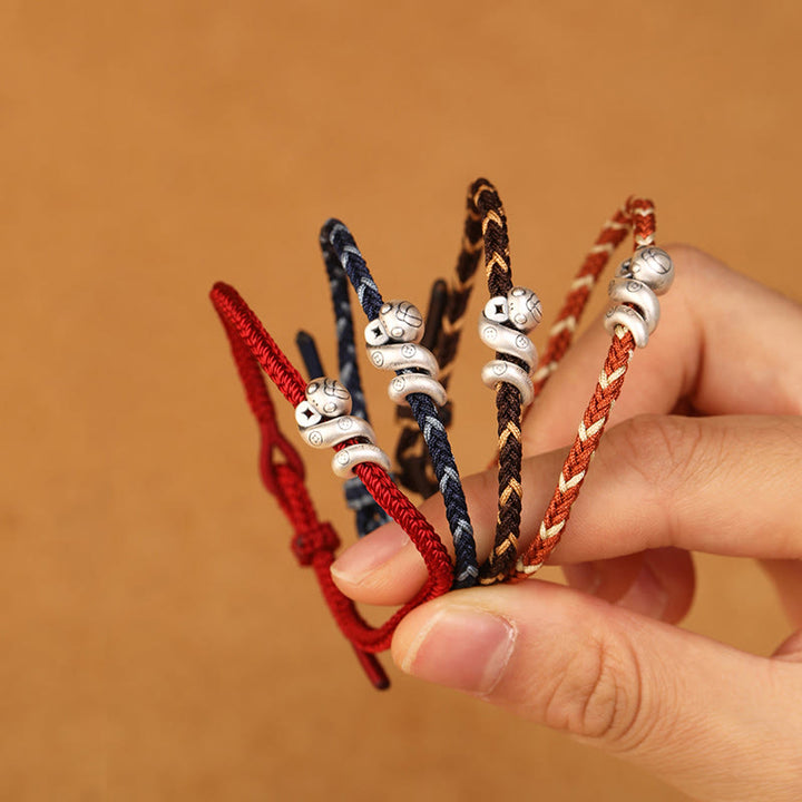 Bracciale intrecciato con protezione per monete in rame fatto a mano con Buddha Stones in argento sterling 999 Anno del serpente - image 1