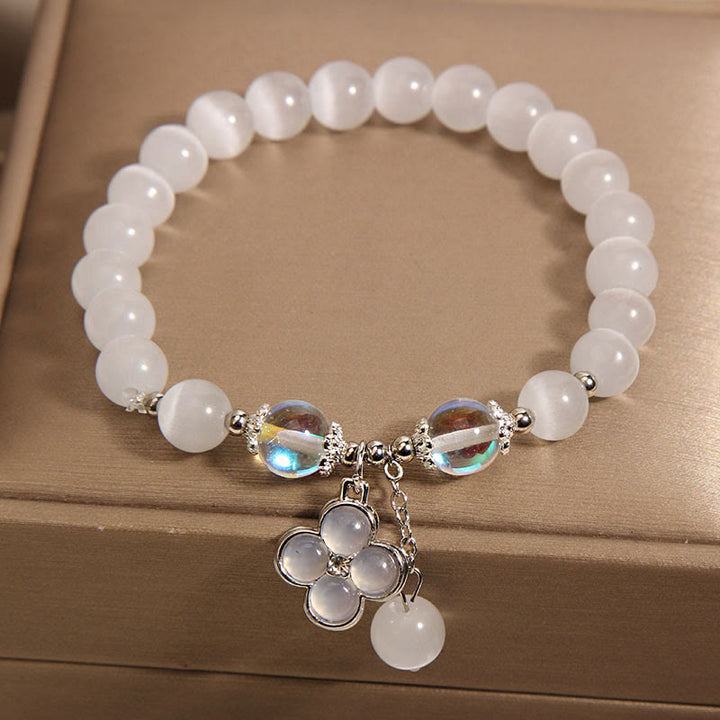 Braccialetto dell'amore con ciondolo a forma di quadrifoglio fortunato con cristalli occhio di gatto Buddha Stones