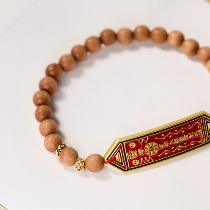 Braccialetto dell'armonia con perline di legno di sandalo , Buddha Stones , rame placcato oro, carattere cinese Bagua Yin Yang