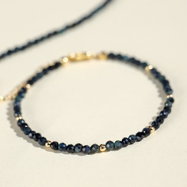 Braccialetto della saggezza con perle di rame, tormalina e indicolite Buddha Stones