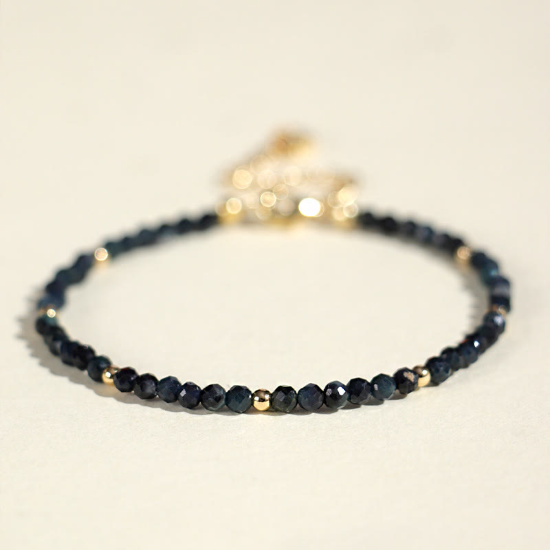 Braccialetto della saggezza con perle di rame, tormalina e indicolite Buddha Stones