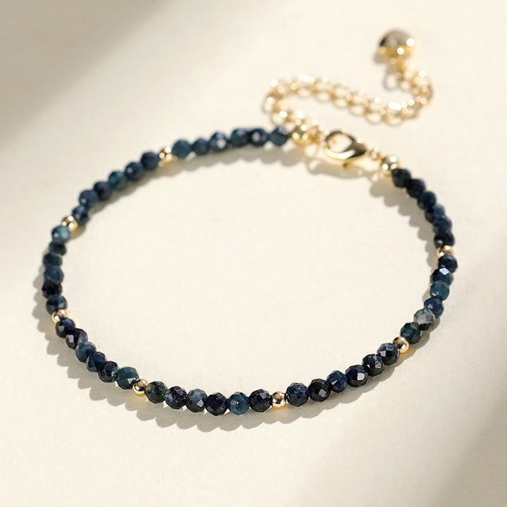 Braccialetto della saggezza con perle di rame, tormalina e indicolite Buddha Stones