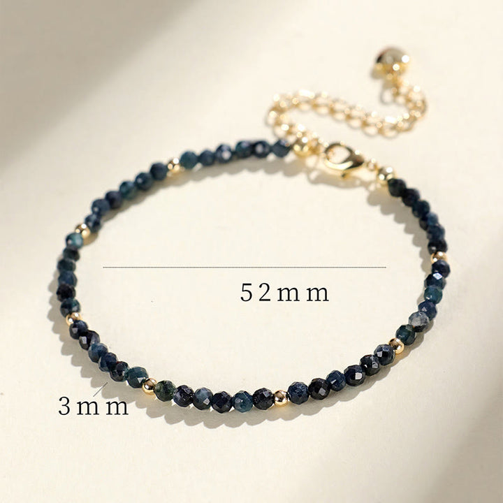 Braccialetto della saggezza con perle di rame, tormalina e indicolite Buddha Stones