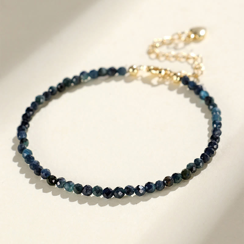 Braccialetto della saggezza con perle di rame, tormalina e indicolite Buddha Stones