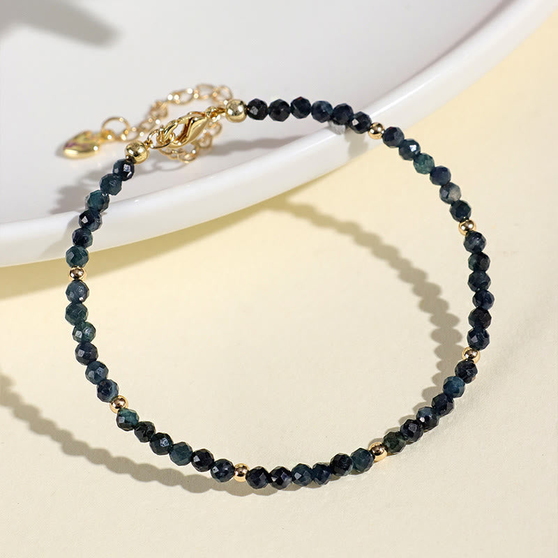 Braccialetto della saggezza con perle di rame, tormalina e indicolite Buddha Stones