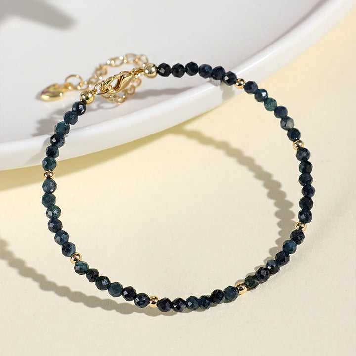 Braccialetto della saggezza con perle di rame, tormalina e indicolite Buddha Stones