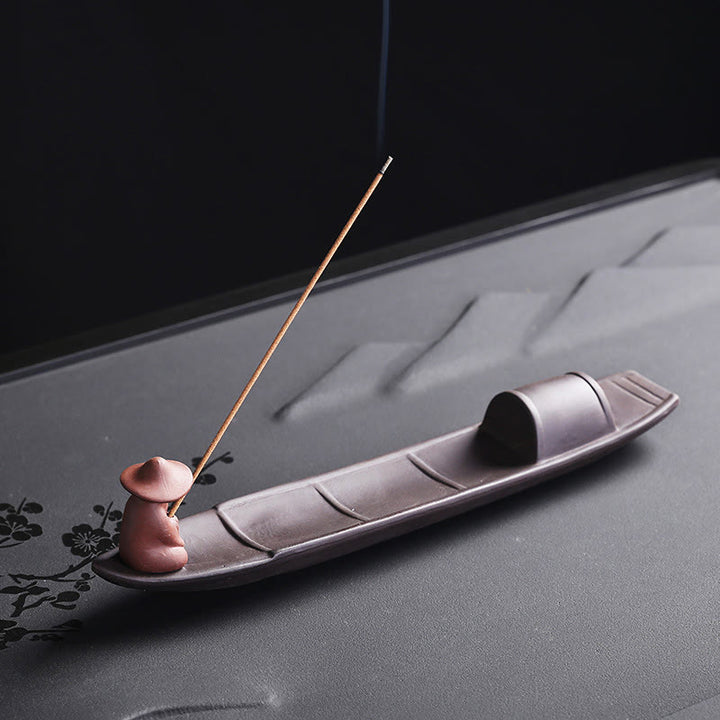 Buddha Stones Pescatore Barca Viola Argilla Pace Guarigione Ceramica Bastoncino Bruciatore Incenso Decorazione