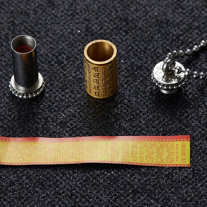 Collana con ciondolo in acciaio al titanio e Buddha Stones, ruota della preghiera, scritture, equilibrio