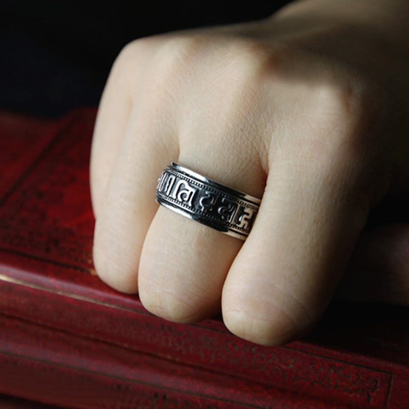 Anello di equilibrio girevole in acciaio al titanio Buddha Stones tibetane Om Mani Padme Hum