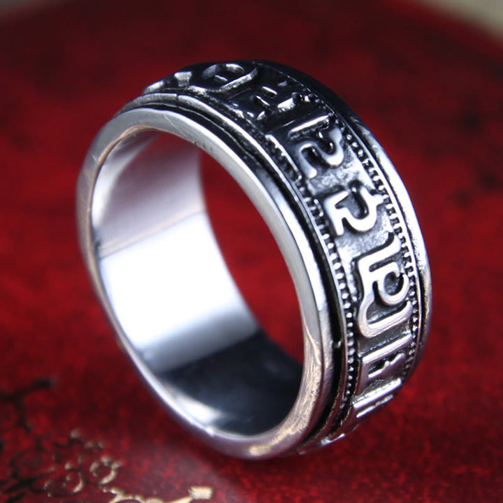 Anello di equilibrio girevole in acciaio al titanio Buddha Stones tibetane Om Mani Padme Hum