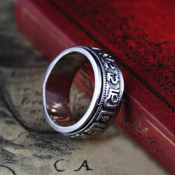 Anello di equilibrio girevole in acciaio al titanio Buddha Stones tibetane Om Mani Padme Hum