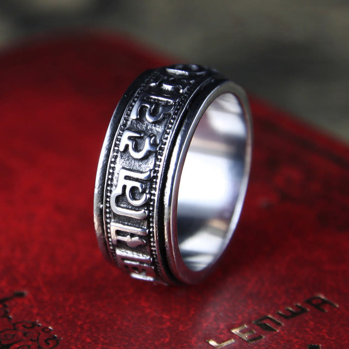 Anello di equilibrio girevole in acciaio al titanio Buddha Stones tibetane Om Mani Padme Hum