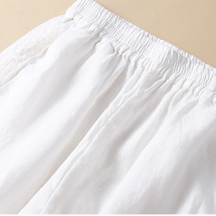 Pantaloni da donna in lino con tasche e ricamo floreale tinta unita Buddha Stones