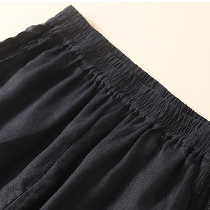 Pantaloni da donna in lino con tasche e ricamo floreale tinta unita Buddha Stones