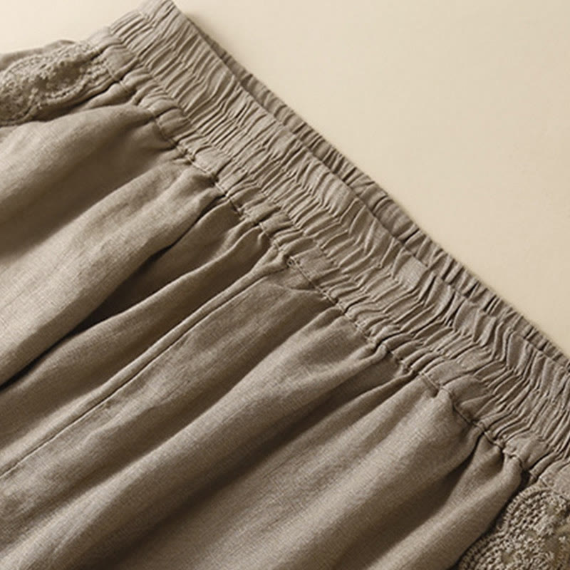 Pantaloni da donna in lino con tasche e ricamo floreale tinta unita Buddha Stones