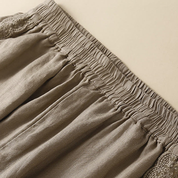 Pantaloni da donna in lino con tasche e ricamo floreale tinta unita Buddha Stones