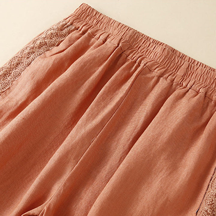 Pantaloni da donna in lino con tasche e ricamo floreale tinta unita Buddha Stones