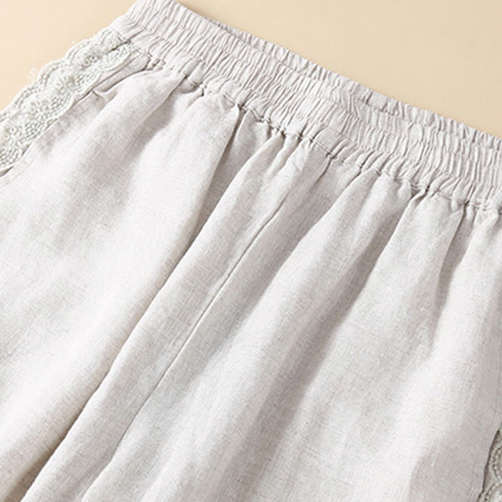Pantaloni da donna in lino con tasche e ricamo floreale tinta unita Buddha Stones