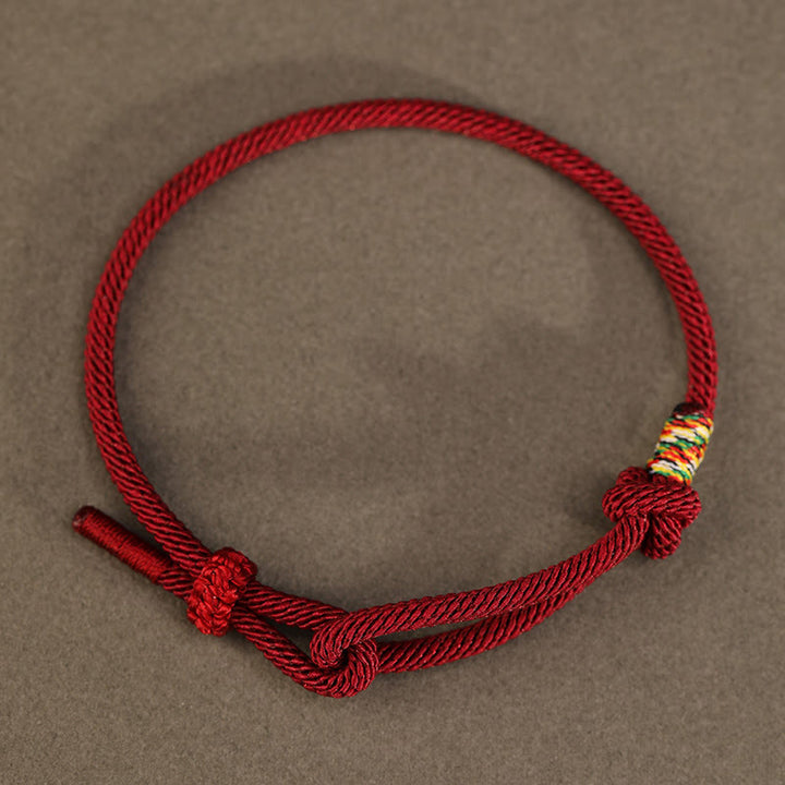 Braccialetto portafortuna con moneta in argento sterling 925 e argento sterling 999 con cordino rosso Buddha Stones - image 1