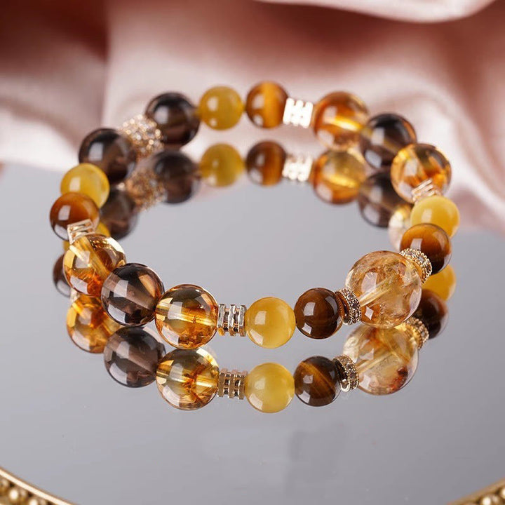 Braccialetto della felicità con occhio di tigre, citrino e topazio Buddha Stones
