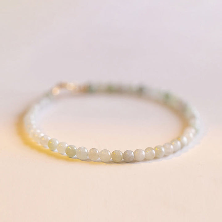 Braccialetto portafortuna in rame placcato oro 14k con perline ultrasottili in giada da 2 mm Buddha Stones