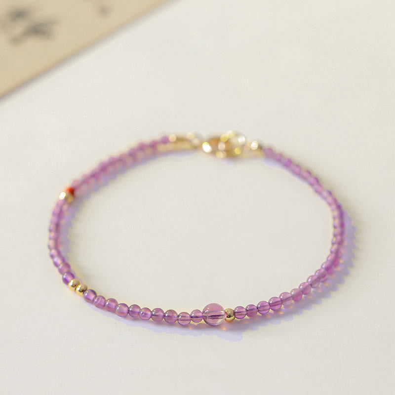 Braccialetto di meditazione per la pace interiore in rame placcato oro 14k con perline ultrasottili da 2 mm Buddha Stones Ametista naturale
