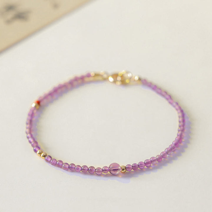 Braccialetto di meditazione per la pace interiore in rame placcato oro 14k con perline ultrasottili da 2 mm Buddha Stones Ametista naturale