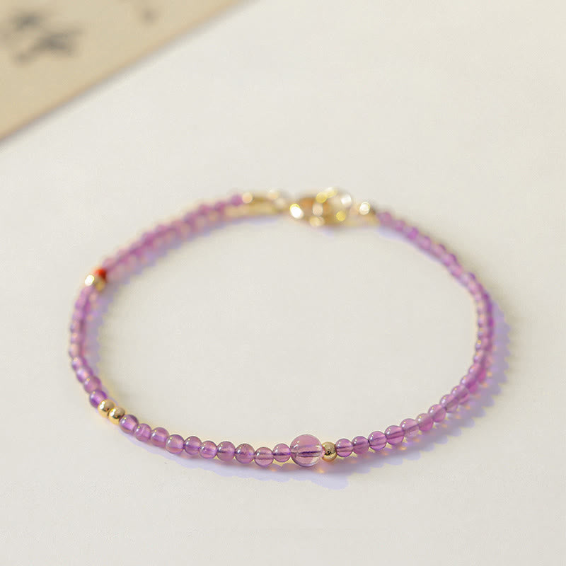 Braccialetto di meditazione per la pace interiore in rame placcato oro 14k con perline ultrasottili da 2 mm Buddha Stones Ametista naturale