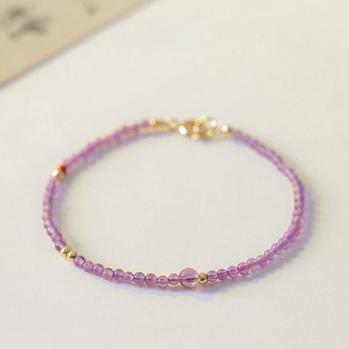 Braccialetto di meditazione per la pace interiore in rame placcato oro 14k con perline ultrasottili da 2 mm Buddha Stones Ametista naturale