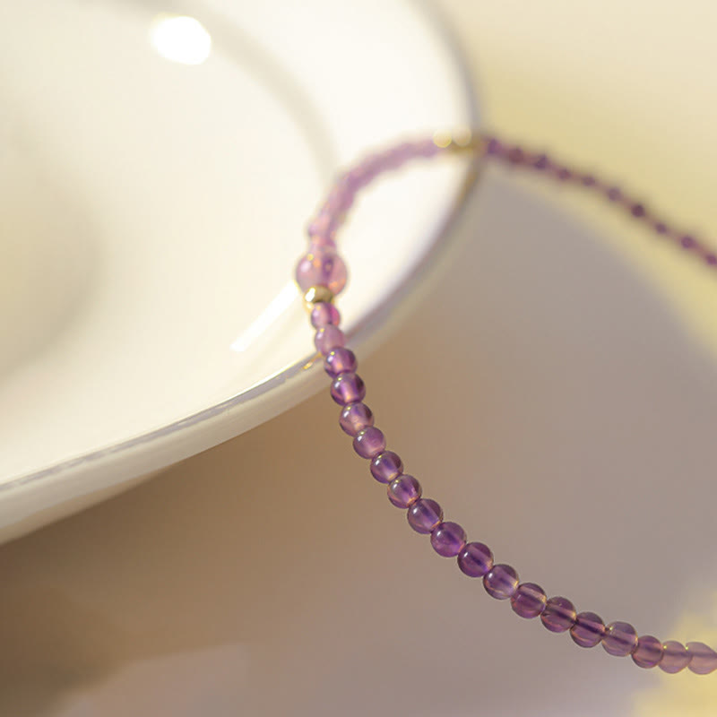 Braccialetto di meditazione per la pace interiore in rame placcato oro 14k con perline ultrasottili da 2 mm Buddha Stones Ametista naturale