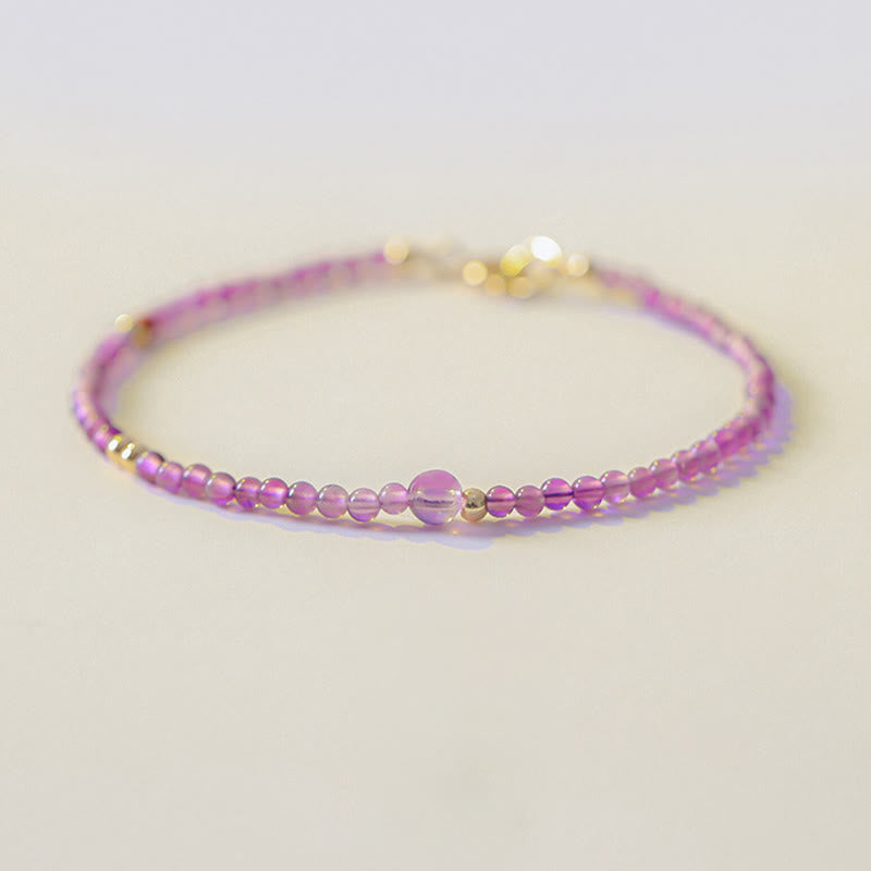 Braccialetto di meditazione per la pace interiore in rame placcato oro 14k con perline ultrasottili da 2 mm Buddha Stones Ametista naturale