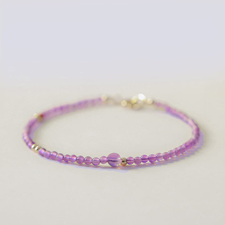 Braccialetto di meditazione per la pace interiore in rame placcato oro 14k con perline ultrasottili da 2 mm Buddha Stones Ametista naturale