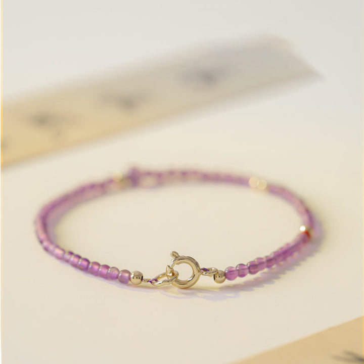 Braccialetto di meditazione per la pace interiore in rame placcato oro 14k con perline ultrasottili da 2 mm Buddha Stones Ametista naturale