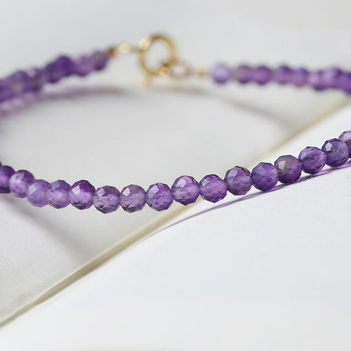 Bracciale di consapevolezza spirituale in rame placcato oro 14k con perline ultrasottili in ametista naturale da 3 mm Buddha Stones