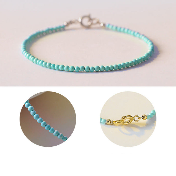 Braccialetto della saggezza in rame placcato oro 14k con perline ultrasottili color turchese da 2 mm Buddha Stones
