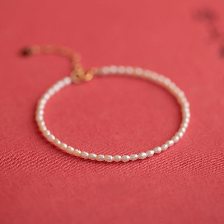 Braccialetto della saggezza in rame placcato oro 14k con perle naturali da 2 mm e perle ultrasottili Buddha Stones