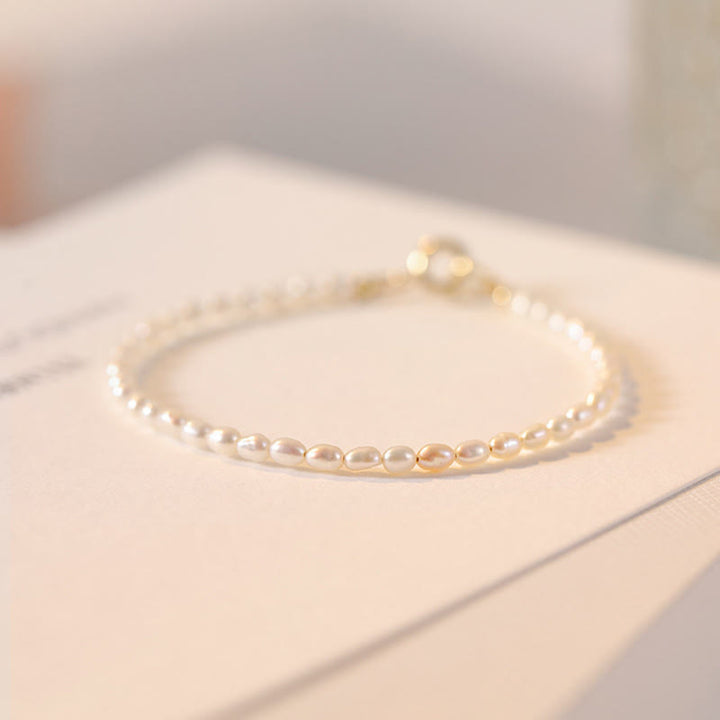 Braccialetto della saggezza in rame placcato oro 14k con perle naturali da 2 mm e perle ultrasottili Buddha Stones