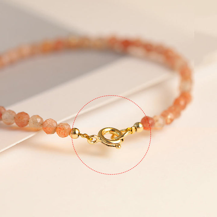Braccialetto della ricchezza in rame placcato oro 14k con perline ultrasottili in pietra del sole da 3 mm Buddha Stones