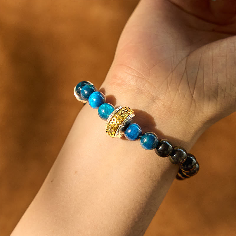 Braccialetto di protezione in occhio di tigre blu ossidiana e argento lucido Buddha Stones