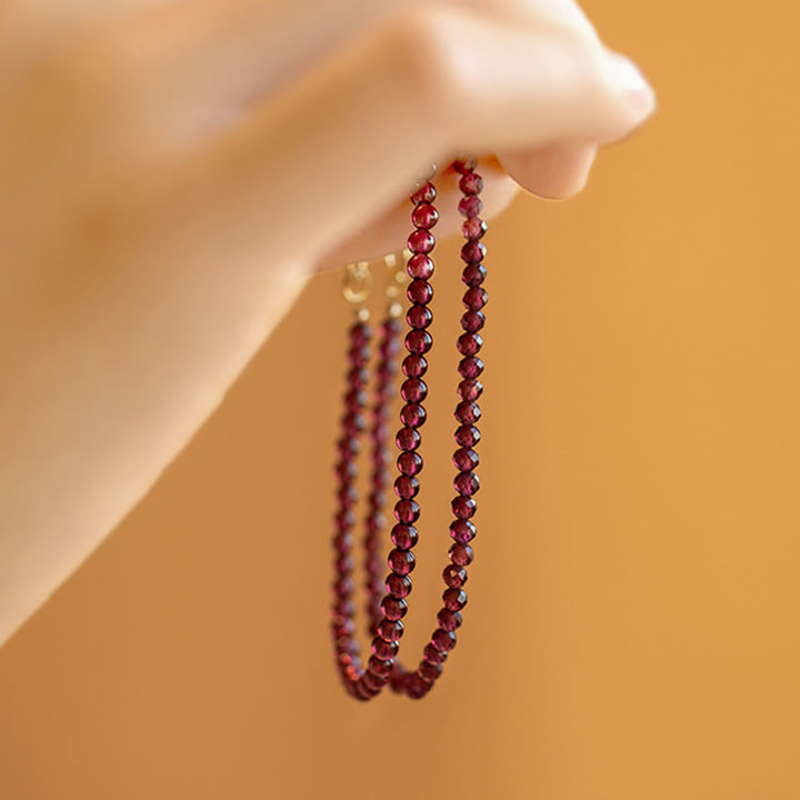 Braccialetto di protezione con perline ultrasottili di granato naturale piccolo da 3 mm Buddha Stones