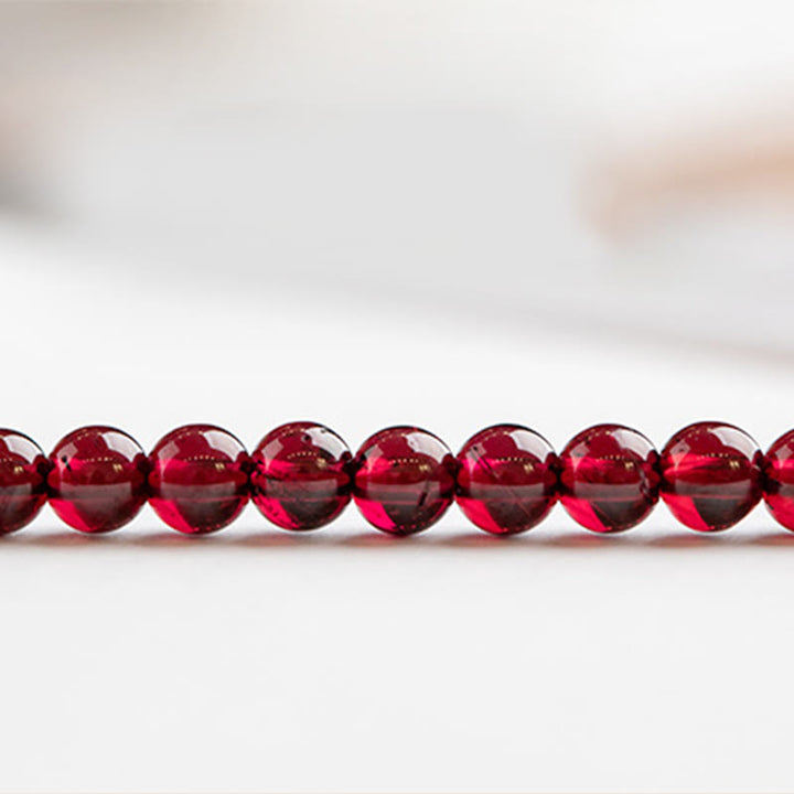 Braccialetto di protezione con perline ultrasottili di granato naturale piccolo da 3 mm Buddha Stones