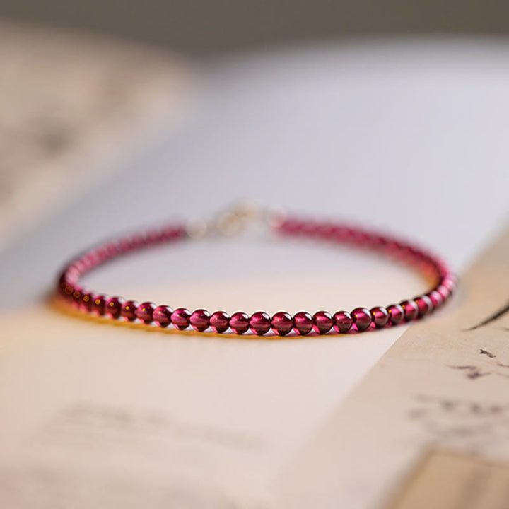 Braccialetto di protezione con perline ultrasottili di granato naturale piccolo da 3 mm Buddha Stones